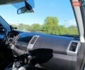 Белый Мицубиси Аутлендер, объемом двигателя 2.36 л и пробегом 168 тыс. км за 12300 $, фото 30 на Automoto.ua