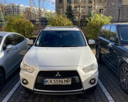 Белый Мицубиси Аутлендер, объемом двигателя 2.4 л и пробегом 154 тыс. км за 12500 $, фото 1 на Automoto.ua