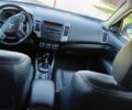 Белый Мицубиси Аутлендер, объемом двигателя 2.2 л и пробегом 232 тыс. км за 11100 $, фото 13 на Automoto.ua