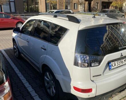 Белый Мицубиси Аутлендер, объемом двигателя 2.4 л и пробегом 154 тыс. км за 12500 $, фото 3 на Automoto.ua