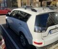 Белый Мицубиси Аутлендер, объемом двигателя 2.4 л и пробегом 154 тыс. км за 12500 $, фото 3 на Automoto.ua