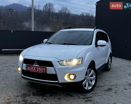 Белый Мицубиси Аутлендер, объемом двигателя 2.3 л и пробегом 161 тыс. км за 11150 $, фото 4 на Automoto.ua