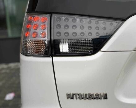 Белый Мицубиси Аутлендер, объемом двигателя 2 л и пробегом 248 тыс. км за 10490 $, фото 9 на Automoto.ua