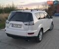 Белый Мицубиси Аутлендер, объемом двигателя 2.27 л и пробегом 191 тыс. км за 10999 $, фото 1 на Automoto.ua