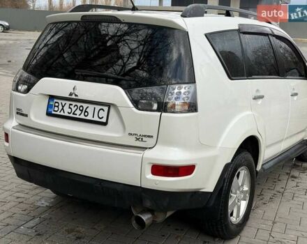 Белый Мицубиси Аутлендер, объемом двигателя 2.35 л и пробегом 192 тыс. км за 9300 $, фото 1 на Automoto.ua