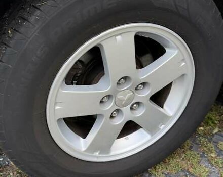 Белый Мицубиси Аутлендер, объемом двигателя 2 л и пробегом 172 тыс. км за 10999 $, фото 29 на Automoto.ua