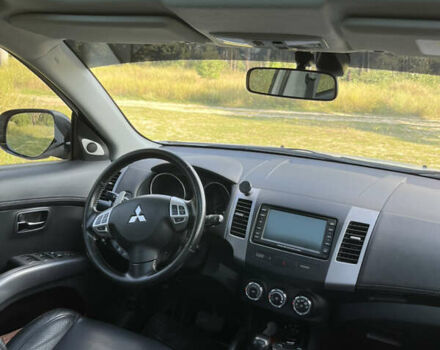 Белый Мицубиси Аутлендер, объемом двигателя 2.4 л и пробегом 170 тыс. км за 14500 $, фото 6 на Automoto.ua