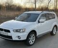 Белый Мицубиси Аутлендер, объемом двигателя 2.4 л и пробегом 161 тыс. км за 11700 $, фото 1 на Automoto.ua