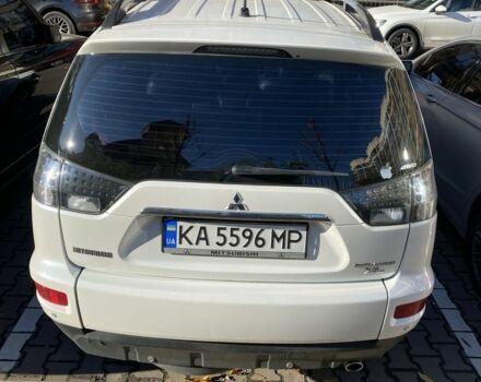Белый Мицубиси Аутлендер, объемом двигателя 2.4 л и пробегом 154 тыс. км за 12500 $, фото 5 на Automoto.ua