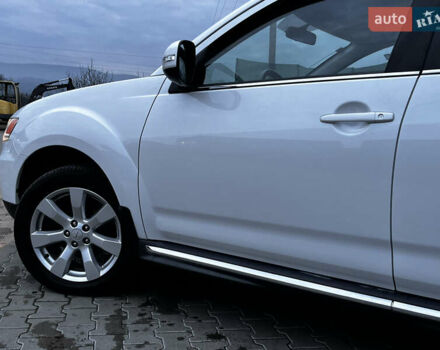 Белый Мицубиси Аутлендер, объемом двигателя 2.3 л и пробегом 161 тыс. км за 11150 $, фото 13 на Automoto.ua