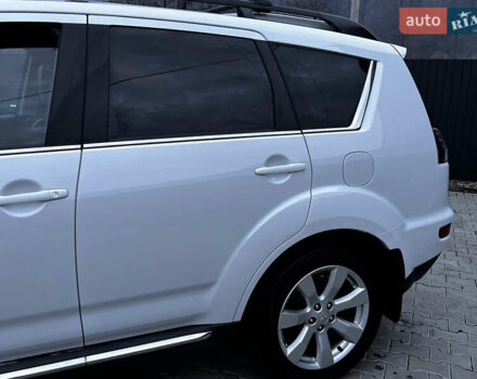 Белый Мицубиси Аутлендер, объемом двигателя 2.3 л и пробегом 161 тыс. км за 11150 $, фото 12 на Automoto.ua
