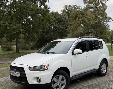 Белый Мицубиси Аутлендер, объемом двигателя 2 л и пробегом 172 тыс. км за 10999 $, фото 2 на Automoto.ua