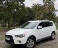 Белый Мицубиси Аутлендер, объемом двигателя 2 л и пробегом 172 тыс. км за 10999 $, фото 2 на Automoto.ua