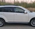 Белый Мицубиси Аутлендер, объемом двигателя 2.27 л и пробегом 191 тыс. км за 10999 $, фото 2 на Automoto.ua