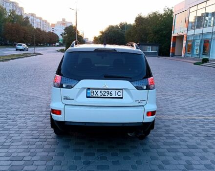 Белый Мицубиси Аутлендер, объемом двигателя 2.4 л и пробегом 187 тыс. км за 9700 $, фото 3 на Automoto.ua