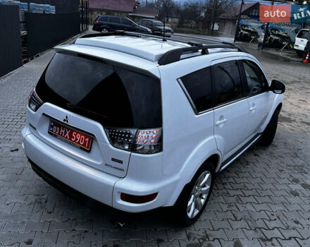 Белый Мицубиси Аутлендер, объемом двигателя 2.3 л и пробегом 161 тыс. км за 11150 $, фото 18 на Automoto.ua