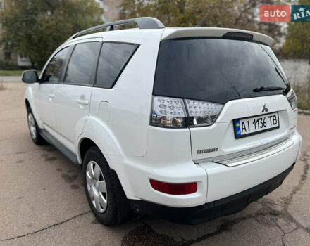 Білий Міцубісі Аутлендер, об'ємом двигуна 2.36 л та пробігом 260 тис. км за 9700 $, фото 24 на Automoto.ua