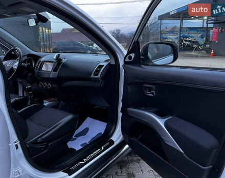 Белый Мицубиси Аутлендер, объемом двигателя 2.3 л и пробегом 161 тыс. км за 11150 $, фото 34 на Automoto.ua