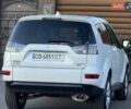 Белый Мицубиси Аутлендер, объемом двигателя 3 л и пробегом 269 тыс. км за 10500 $, фото 28 на Automoto.ua