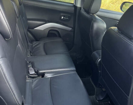 Белый Мицубиси Аутлендер, объемом двигателя 2.4 л и пробегом 170 тыс. км за 14500 $, фото 8 на Automoto.ua