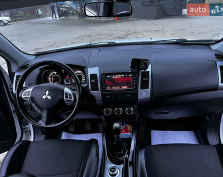 Белый Мицубиси Аутлендер, объемом двигателя 2.3 л и пробегом 161 тыс. км за 11150 $, фото 35 на Automoto.ua