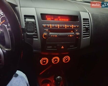 Белый Мицубиси Аутлендер, объемом двигателя 2.2 л и пробегом 232 тыс. км за 10950 $, фото 23 на Automoto.ua