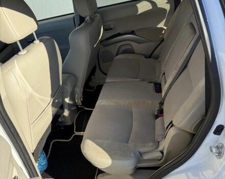 Белый Мицубиси Аутлендер, объемом двигателя 2.4 л и пробегом 223 тыс. км за 10500 $, фото 4 на Automoto.ua