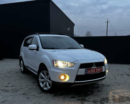 Белый Мицубиси Аутлендер, объемом двигателя 2.3 л и пробегом 161 тыс. км за 11150 $, фото 51 на Automoto.ua