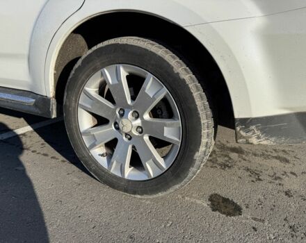 Белый Мицубиси Аутлендер, объемом двигателя 2.4 л и пробегом 223 тыс. км за 10500 $, фото 2 на Automoto.ua