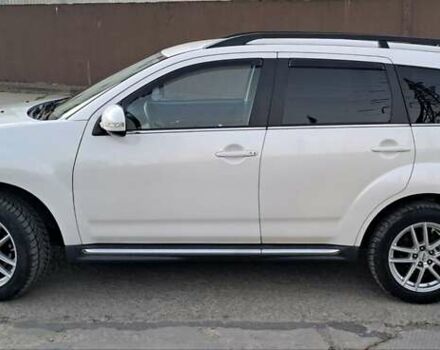 Белый Мицубиси Аутлендер, объемом двигателя 2.27 л и пробегом 191 тыс. км за 10999 $, фото 4 на Automoto.ua