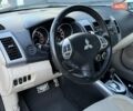 Белый Мицубиси Аутлендер, объемом двигателя 3 л и пробегом 269 тыс. км за 10500 $, фото 47 на Automoto.ua