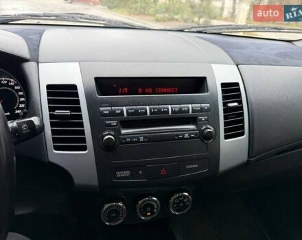 Белый Мицубиси Аутлендер, объемом двигателя 2.35 л и пробегом 192 тыс. км за 9300 $, фото 12 на Automoto.ua