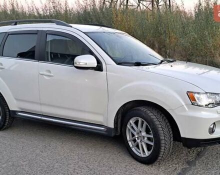 Белый Мицубиси Аутлендер, объемом двигателя 2.27 л и пробегом 191 тыс. км за 10999 $, фото 11 на Automoto.ua
