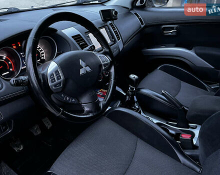 Белый Мицубиси Аутлендер, объемом двигателя 2.3 л и пробегом 161 тыс. км за 11150 $, фото 23 на Automoto.ua