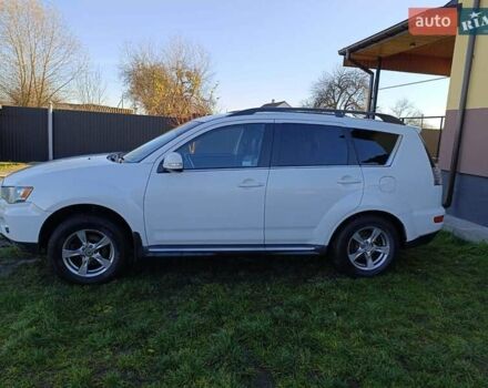 Белый Мицубиси Аутлендер, объемом двигателя 2.2 л и пробегом 232 тыс. км за 10950 $, фото 24 на Automoto.ua