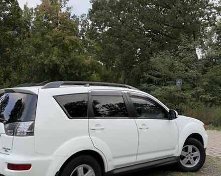 Белый Мицубиси Аутлендер, объемом двигателя 2 л и пробегом 172 тыс. км за 10999 $, фото 7 на Automoto.ua