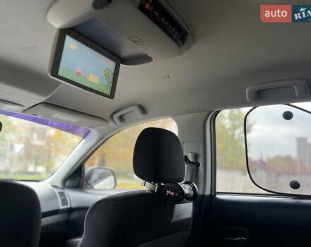 Білий Міцубісі Аутлендер, об'ємом двигуна 2.36 л та пробігом 260 тис. км за 9700 $, фото 17 на Automoto.ua