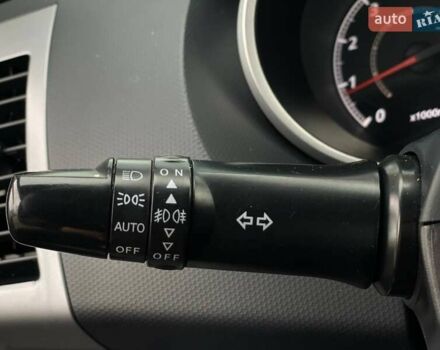 Білий Міцубісі Аутлендер, об'ємом двигуна 2 л та пробігом 248 тис. км за 10490 $, фото 25 на Automoto.ua