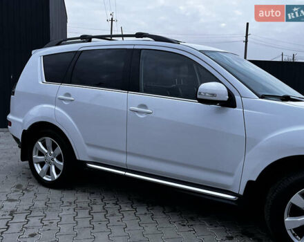 Белый Мицубиси Аутлендер, объемом двигателя 2.3 л и пробегом 161 тыс. км за 11150 $, фото 7 на Automoto.ua