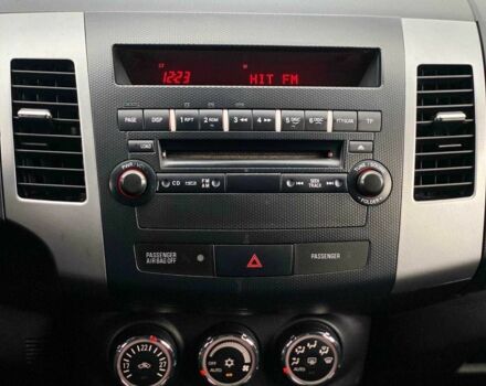 Белый Мицубиси Аутлендер, объемом двигателя 2 л и пробегом 248 тыс. км за 10490 $, фото 15 на Automoto.ua