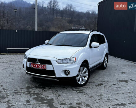 Белый Мицубиси Аутлендер, объемом двигателя 2.3 л и пробегом 161 тыс. км за 11150 $, фото 1 на Automoto.ua