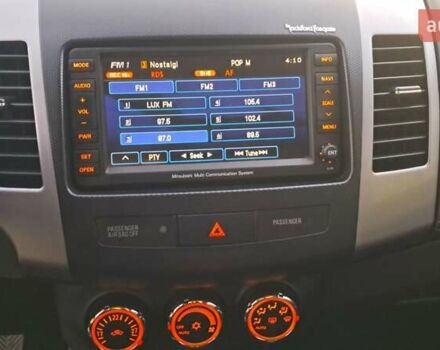 Белый Мицубиси Аутлендер, объемом двигателя 2.27 л и пробегом 191 тыс. км за 10999 $, фото 19 на Automoto.ua