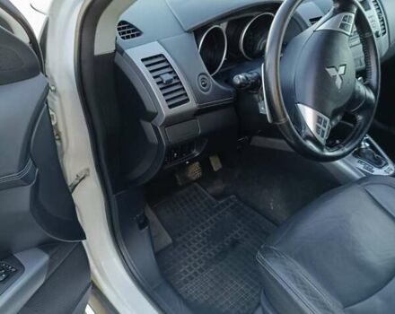 Белый Мицубиси Аутлендер, объемом двигателя 2.2 л и пробегом 232 тыс. км за 10950 $, фото 11 на Automoto.ua