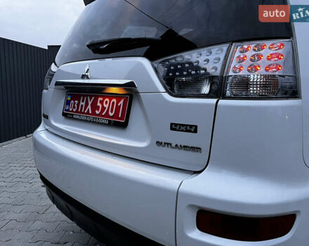 Белый Мицубиси Аутлендер, объемом двигателя 2.3 л и пробегом 161 тыс. км за 11150 $, фото 17 на Automoto.ua