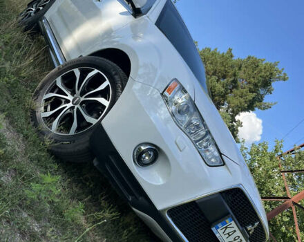 Белый Мицубиси Аутлендер, объемом двигателя 2.4 л и пробегом 170 тыс. км за 14500 $, фото 2 на Automoto.ua