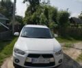 Білий Міцубісі Аутлендер, об'ємом двигуна 2.35 л та пробігом 186 тис. км за 9500 $, фото 1 на Automoto.ua
