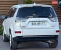 Белый Мицубиси Аутлендер, объемом двигателя 3 л и пробегом 269 тыс. км за 10500 $, фото 24 на Automoto.ua