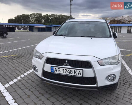 Белый Мицубиси Аутлендер, объемом двигателя 2.18 л и пробегом 285 тыс. км за 11500 $, фото 1 на Automoto.ua