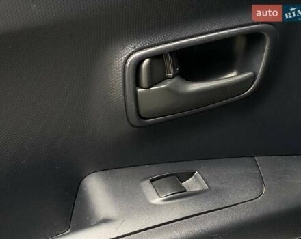 Білий Міцубісі Аутлендер, об'ємом двигуна 2 л та пробігом 248 тис. км за 10490 $, фото 39 на Automoto.ua