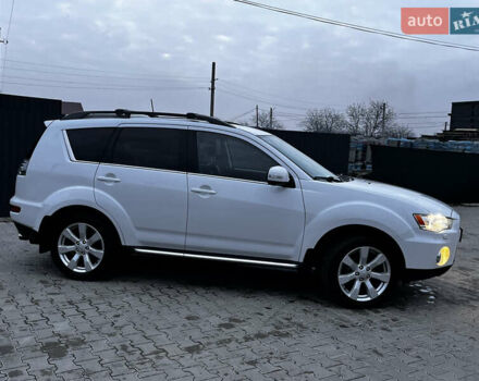 Белый Мицубиси Аутлендер, объемом двигателя 2.3 л и пробегом 161 тыс. км за 11150 $, фото 6 на Automoto.ua